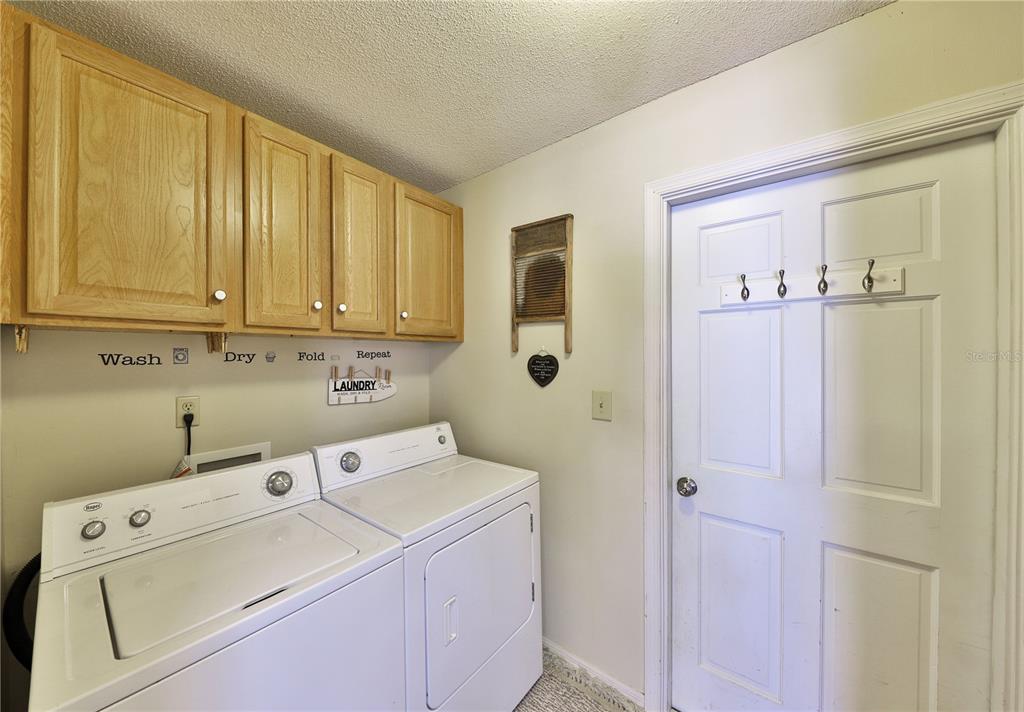 109 Satsuma Drive Altamonte Springs, FL 32714 - Photo 15 of 20 a utility room with dryer and washer