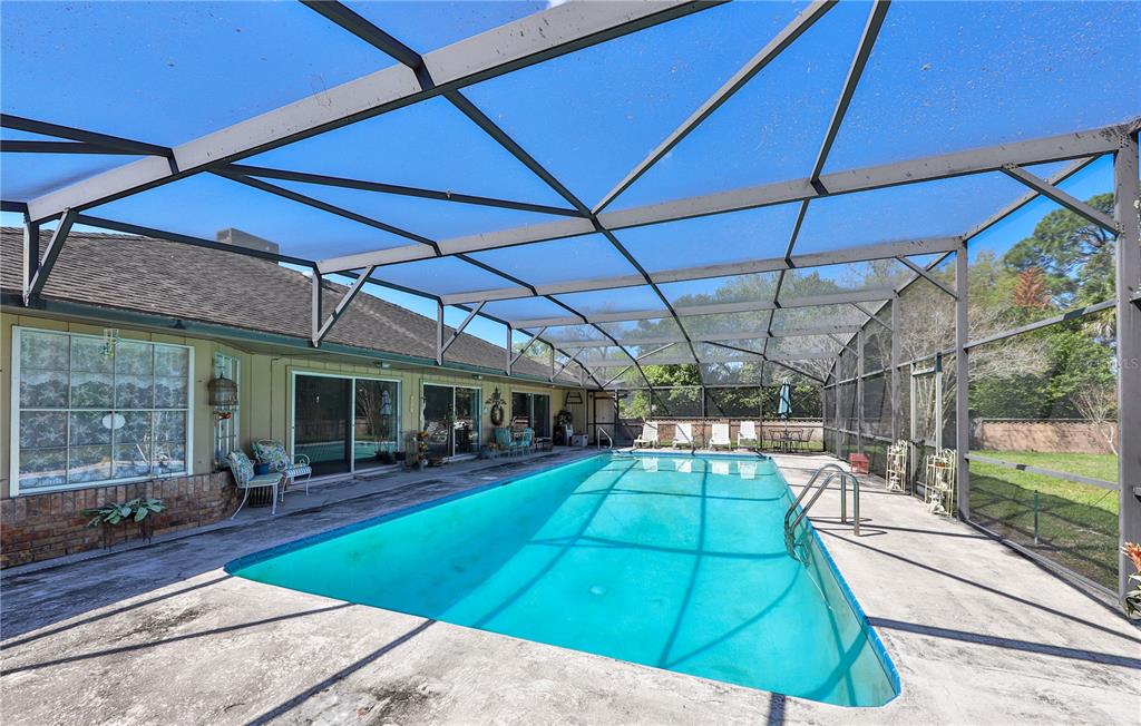 109 Satsuma Drive Altamonte Springs, FL 32714 - Photo 17 of 20 a view of a backyard with sitting area and furniture