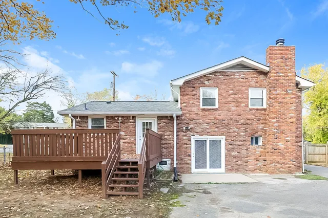a front view of a house with deck