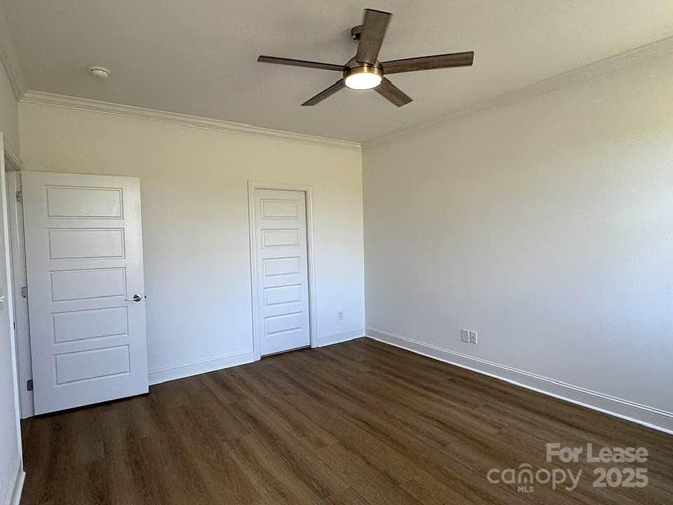 8070 Blackwood Road Denver, NC 28037 - Photo 19 of 39 a view of empty room with wooden floor