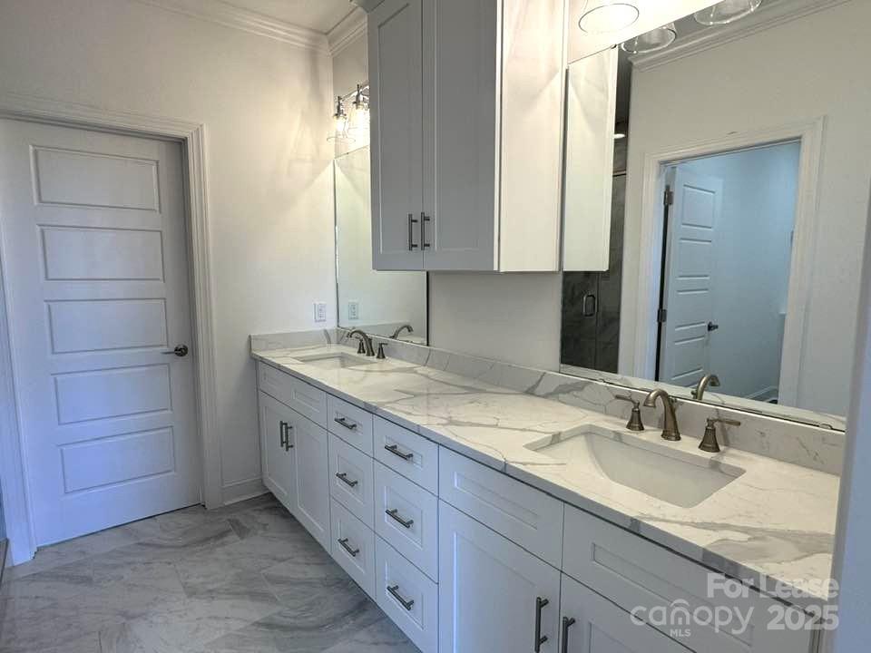 8070 Blackwood Road Denver, NC 28037 - Photo 20 of 39 a bathroom with a granite countertop double vanity sink and mirror