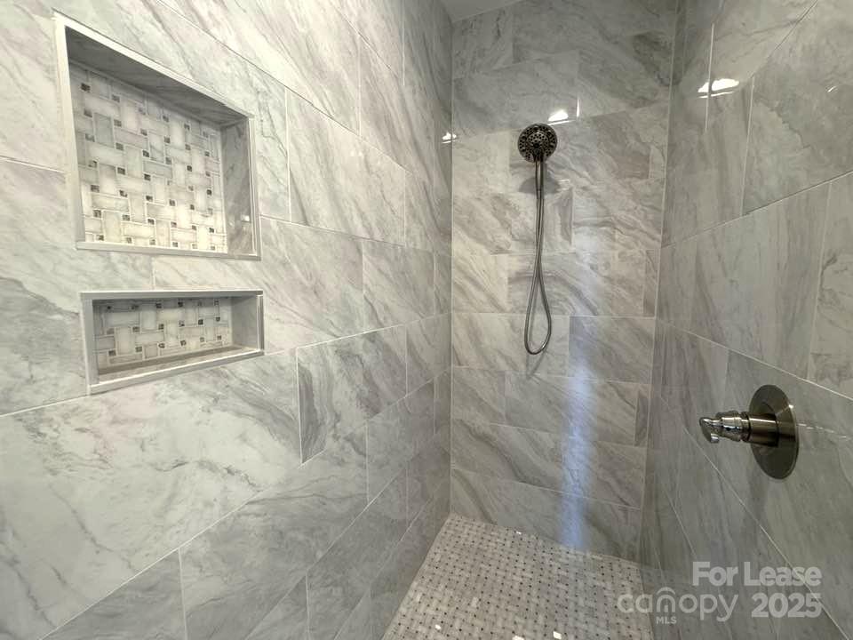 8070 Blackwood Road Denver, NC 28037 - Photo 21 of 39 a bathroom with a shower