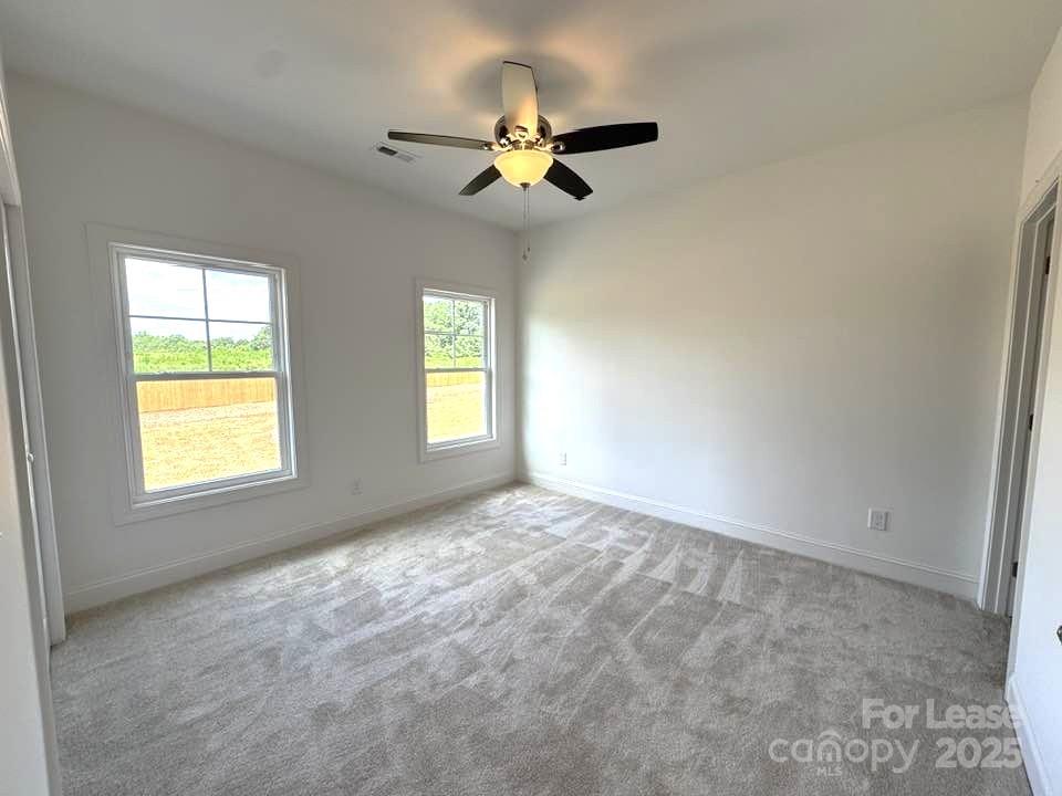 8070 Blackwood Road Denver, NC 28037 - Photo 22 of 39 a view of empty room with window