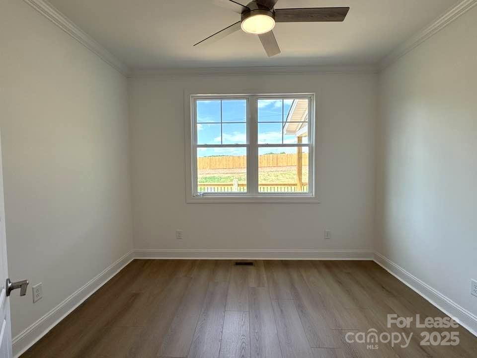 8070 Blackwood Road Denver, NC 28037 - Photo 25 of 39 an empty room with a window