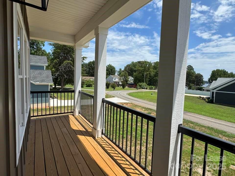 8070 Blackwood Road Denver, NC 28037 - Photo 37 of 39 a view of a porch with a yard