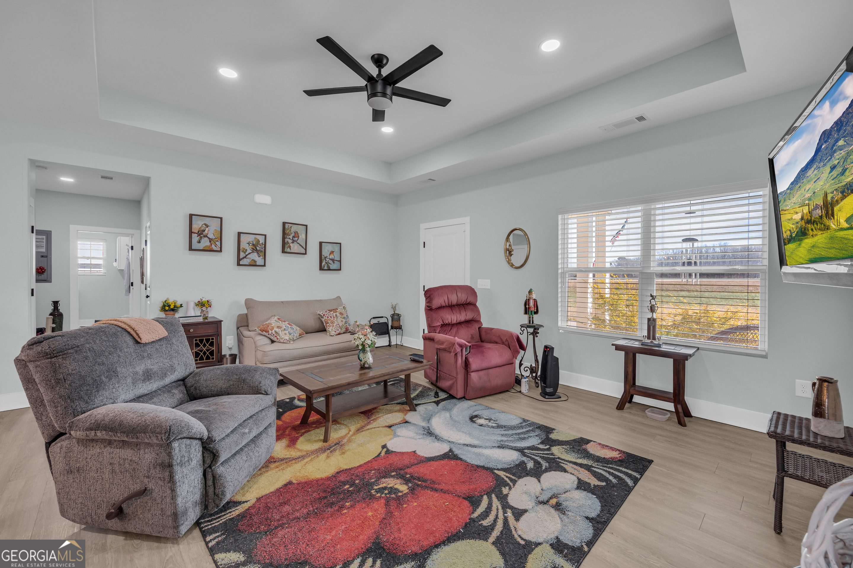 1279 South Fairview Road Lavonia, GA 30553 - Photo 12 of 43 a living room with furniture and a window