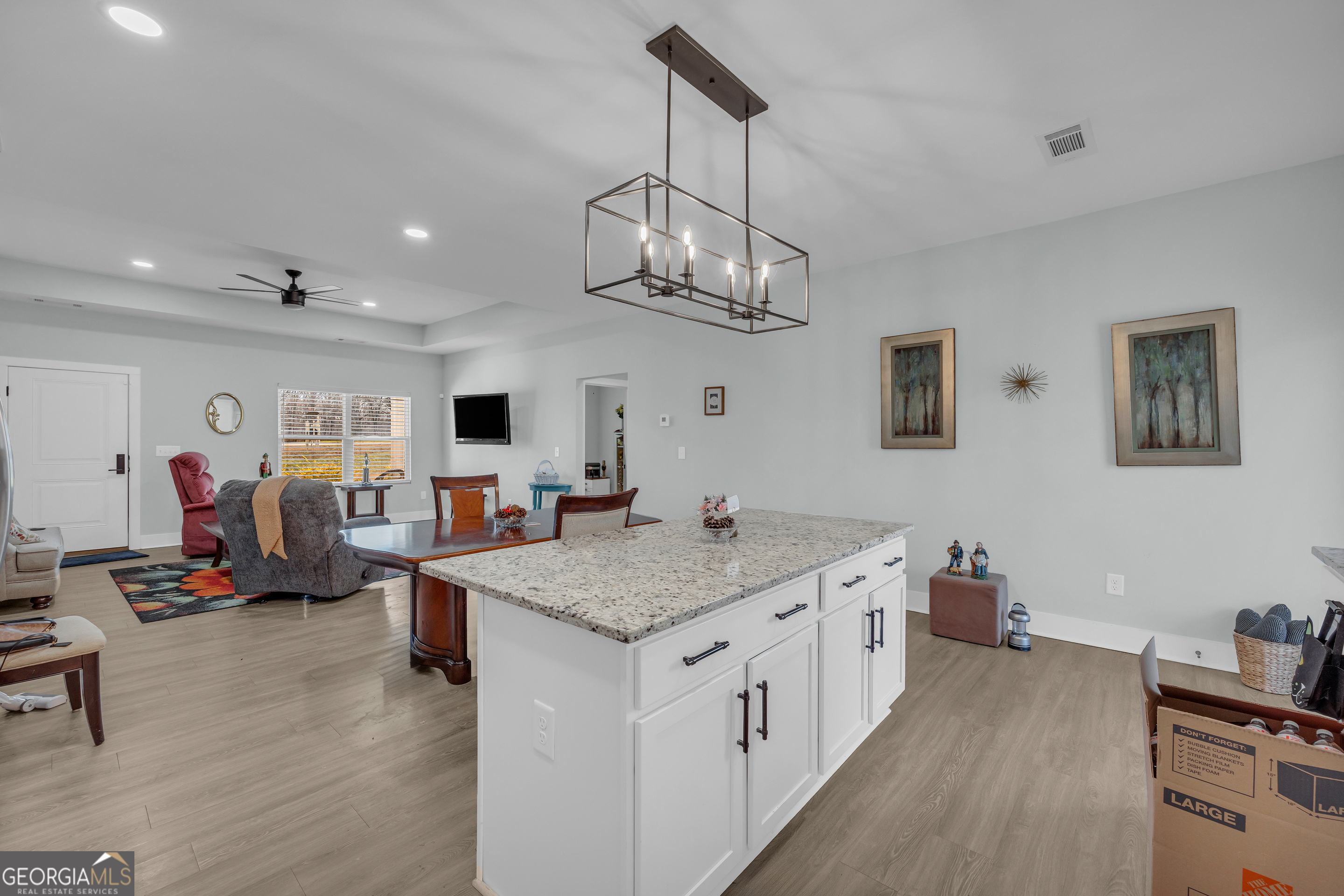 1279 South Fairview Road Lavonia, GA 30553 - Photo 14 of 43 a very nice looking room with furniture and a view of kitchen