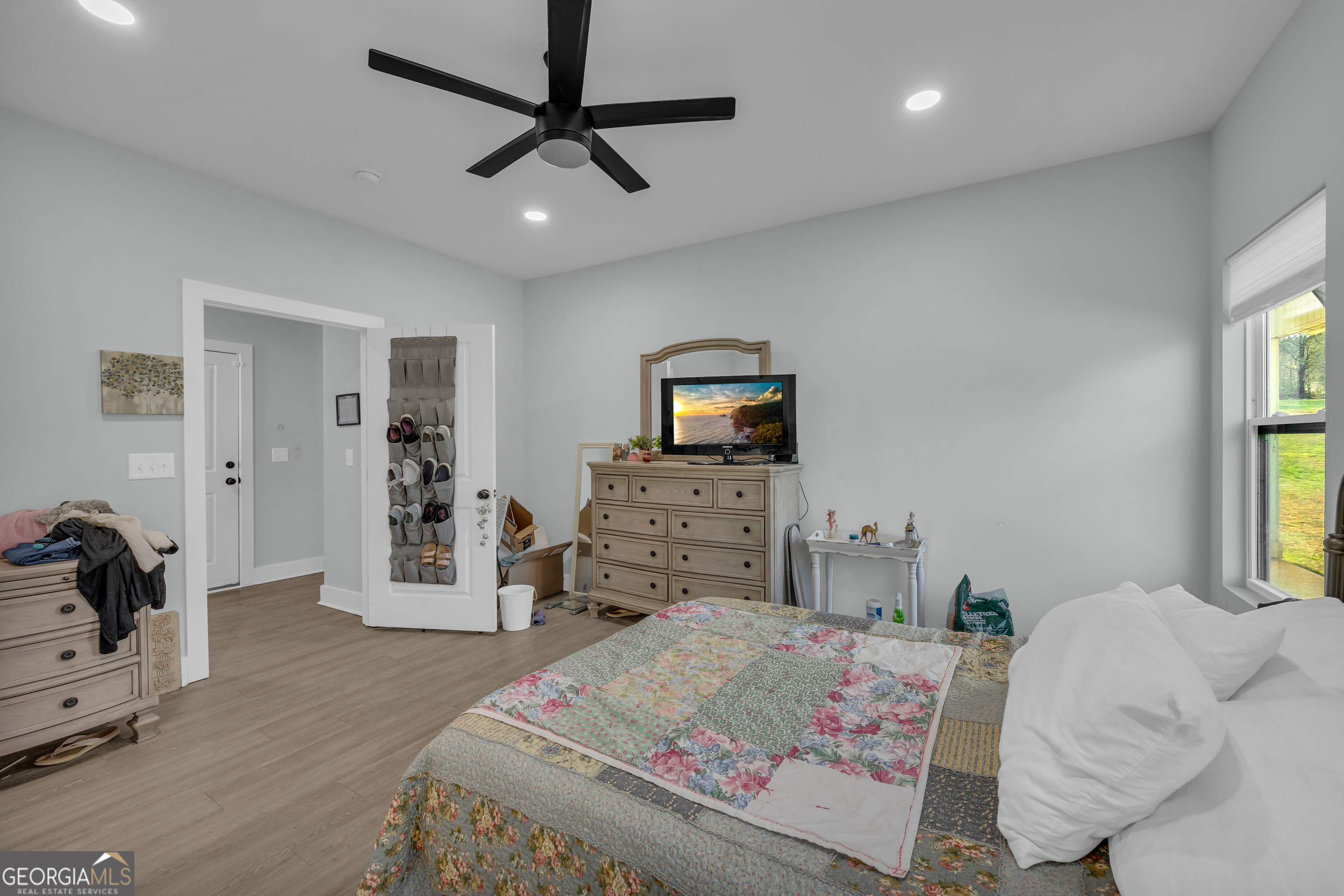 1279 South Fairview Road Lavonia, GA 30553 - Photo 29 of 43 a bedroom with a bed and furniture