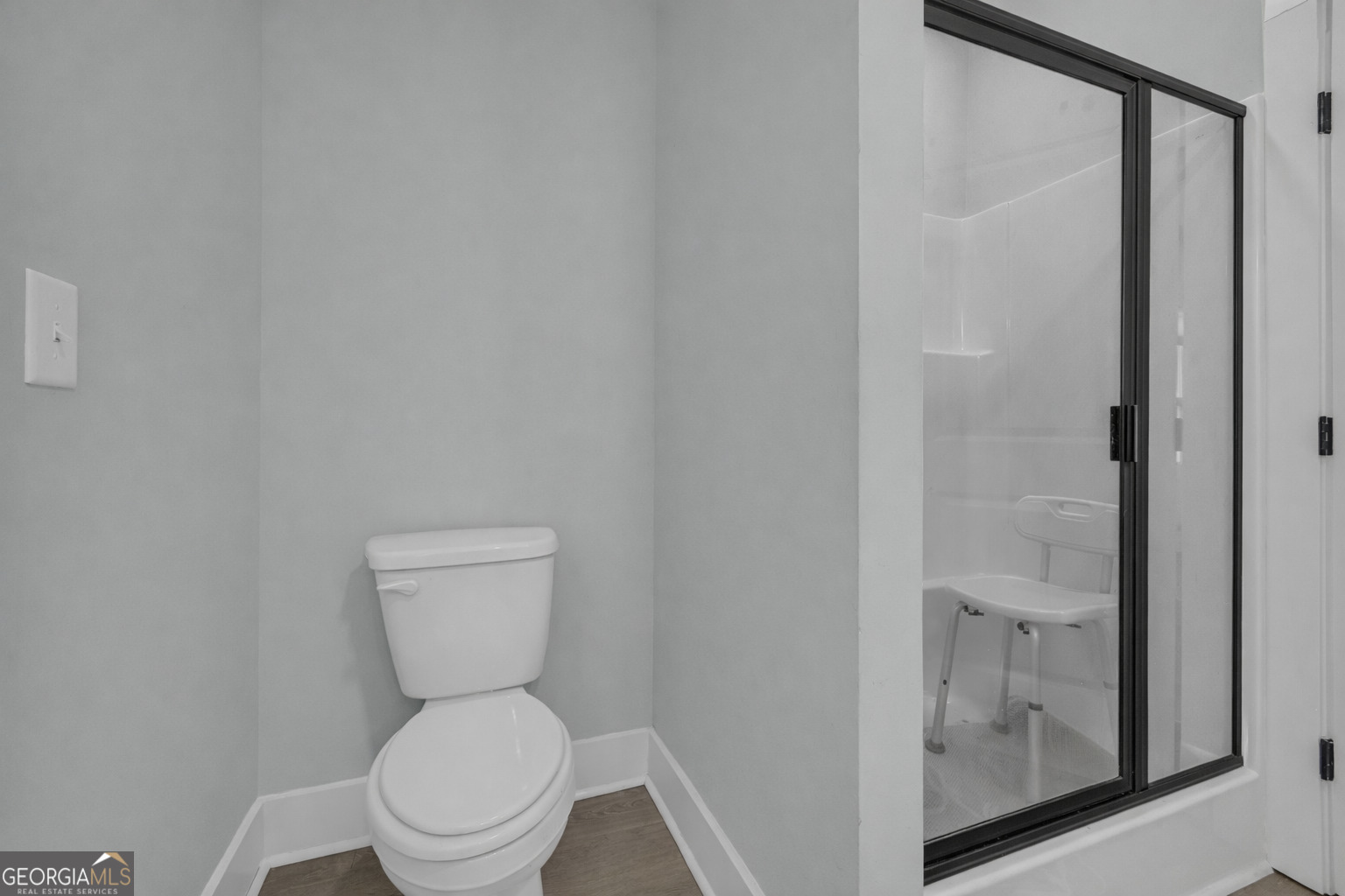 1279 South Fairview Road Lavonia, GA 30553 - Photo 33 of 43 a white toilet sitting next to a bathroom sink