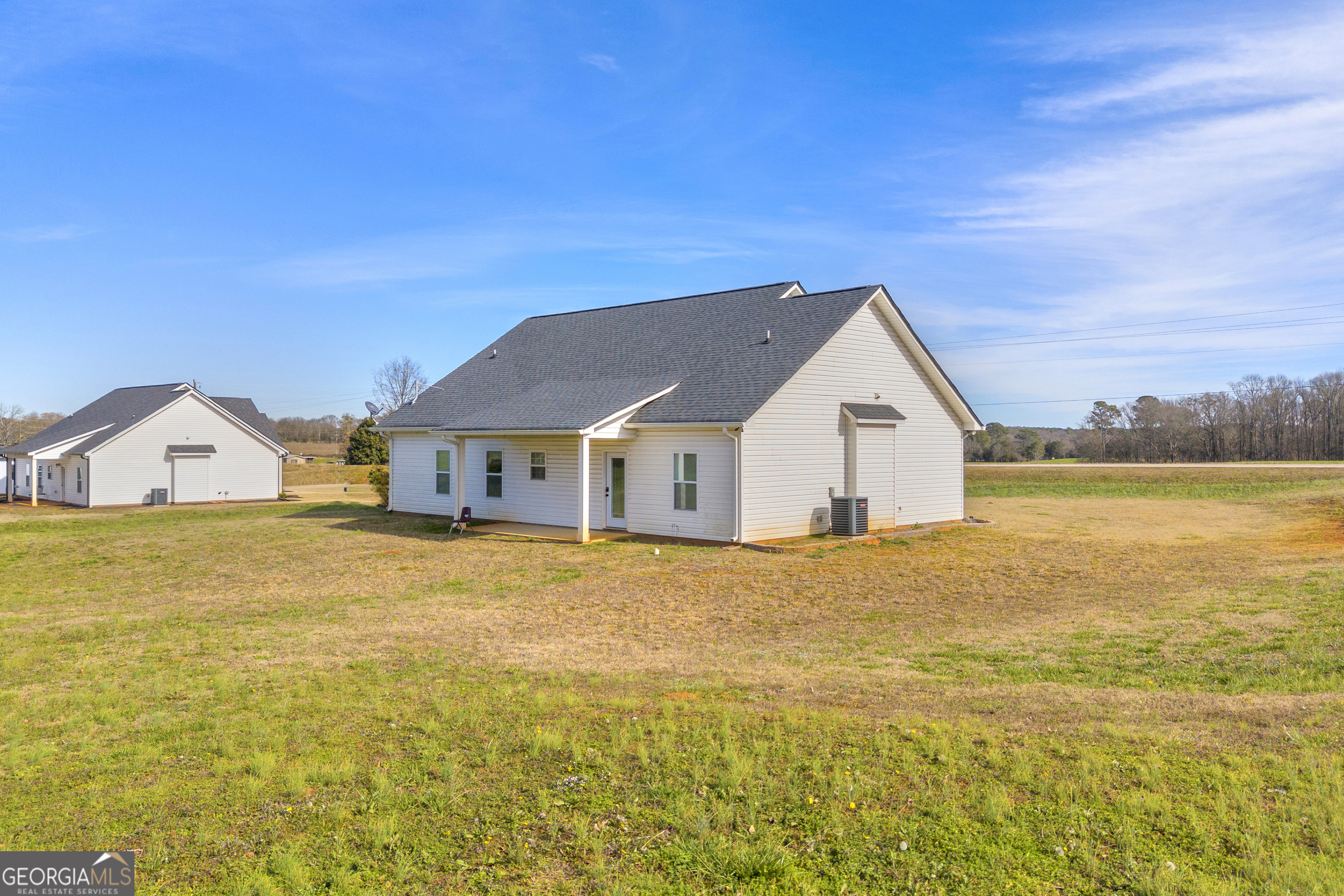 1279 South Fairview Road Lavonia, GA 30553 - Photo 8 of 43 a view of house with yard and ocean view