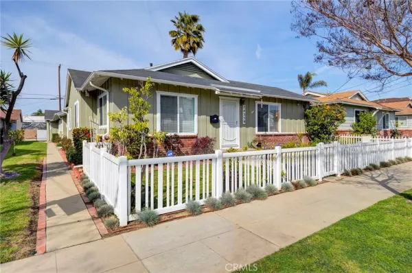 a front view of a house with a porch