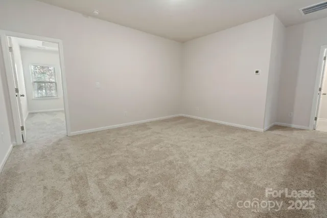 an empty room with an entryway