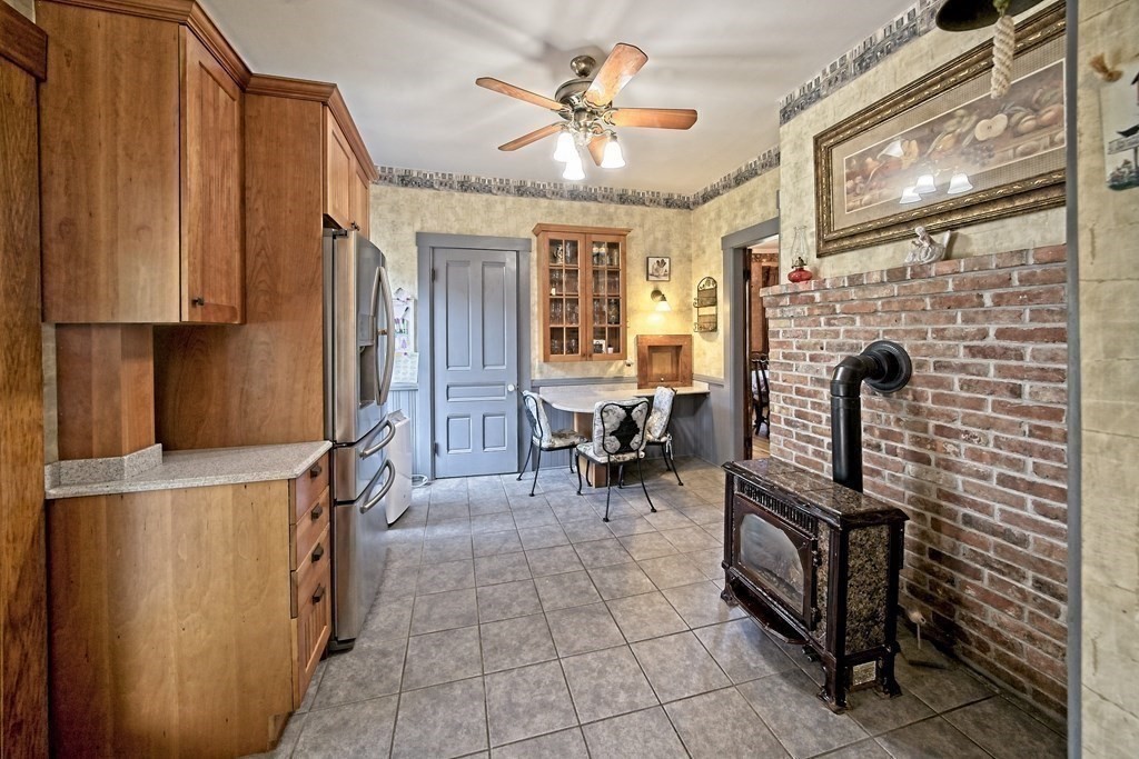 138 Walnut Street Clinton, MA 01510 - Photo 15 of 42 a view of a livingroom with furniture and a ceiling fan