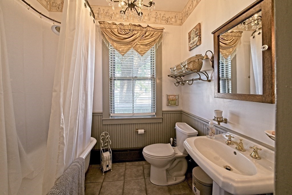 138 Walnut Street Clinton, MA 01510 - Photo 16 of 42 a bathroom with a toilet sink and mirror