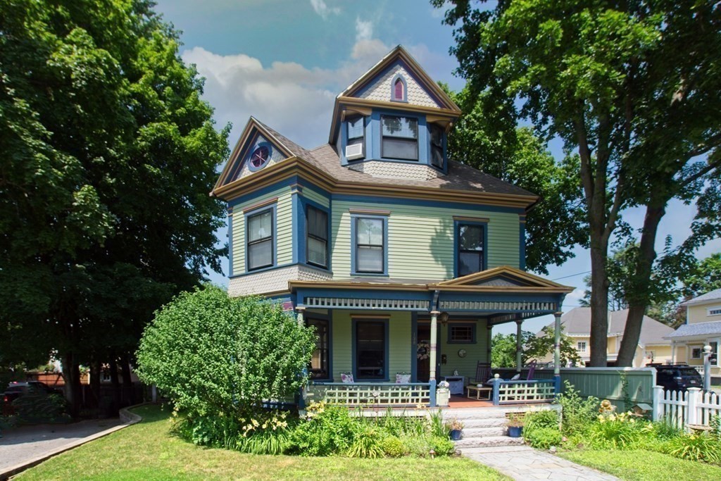 138 Walnut Street Clinton, MA 01510 - Photo 2 of 42 a front view of a house with garden