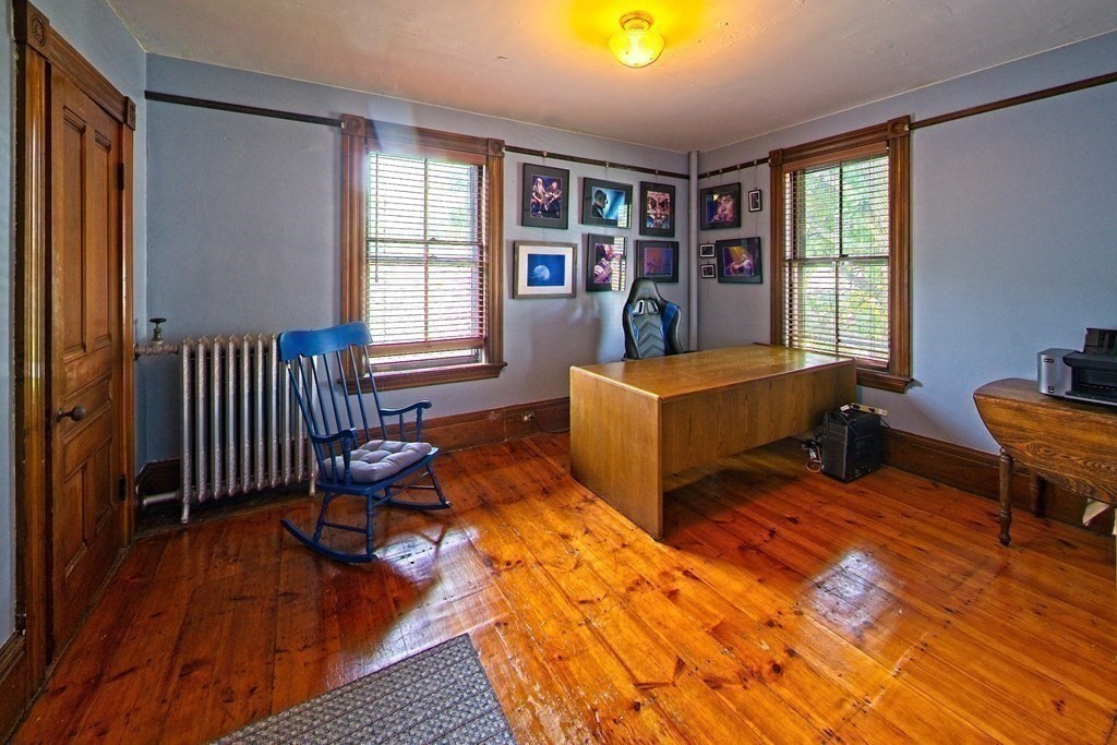 138 Walnut Street Clinton, MA 01510 - Photo 22 of 42 a living room with furniture rug and a window