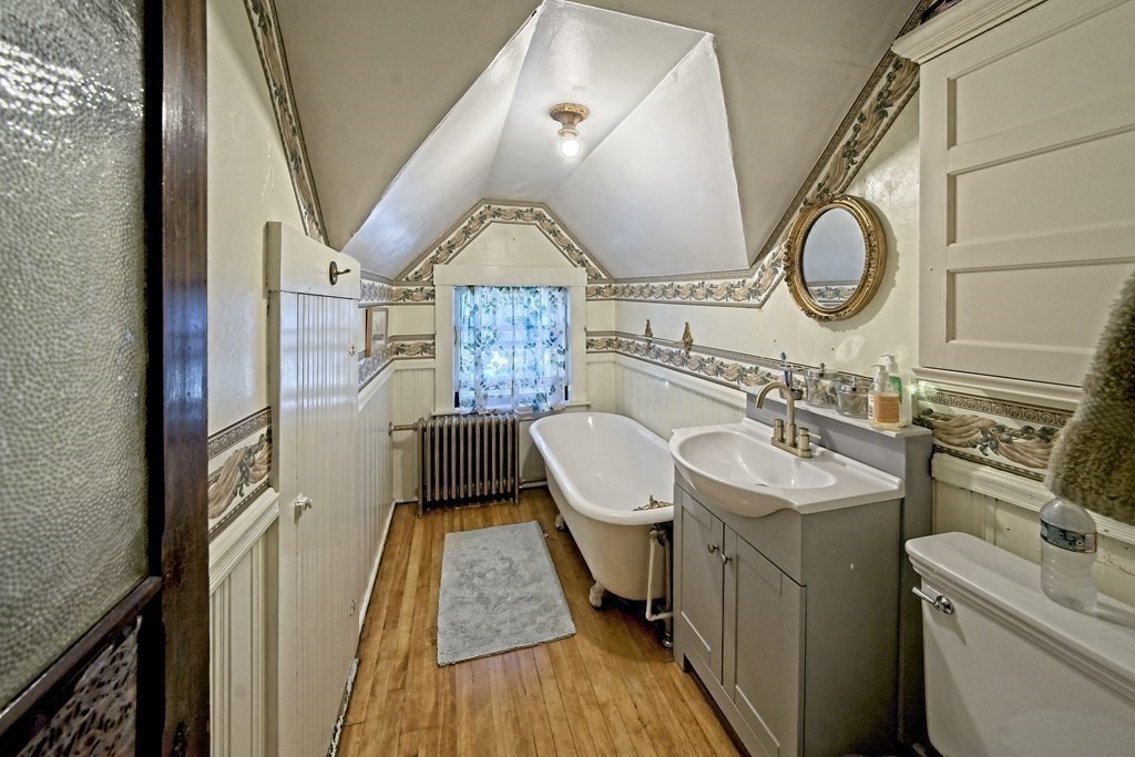 138 Walnut Street Clinton, MA 01510 - Photo 26 of 42 a bathroom with a toilet a sink and a mirror