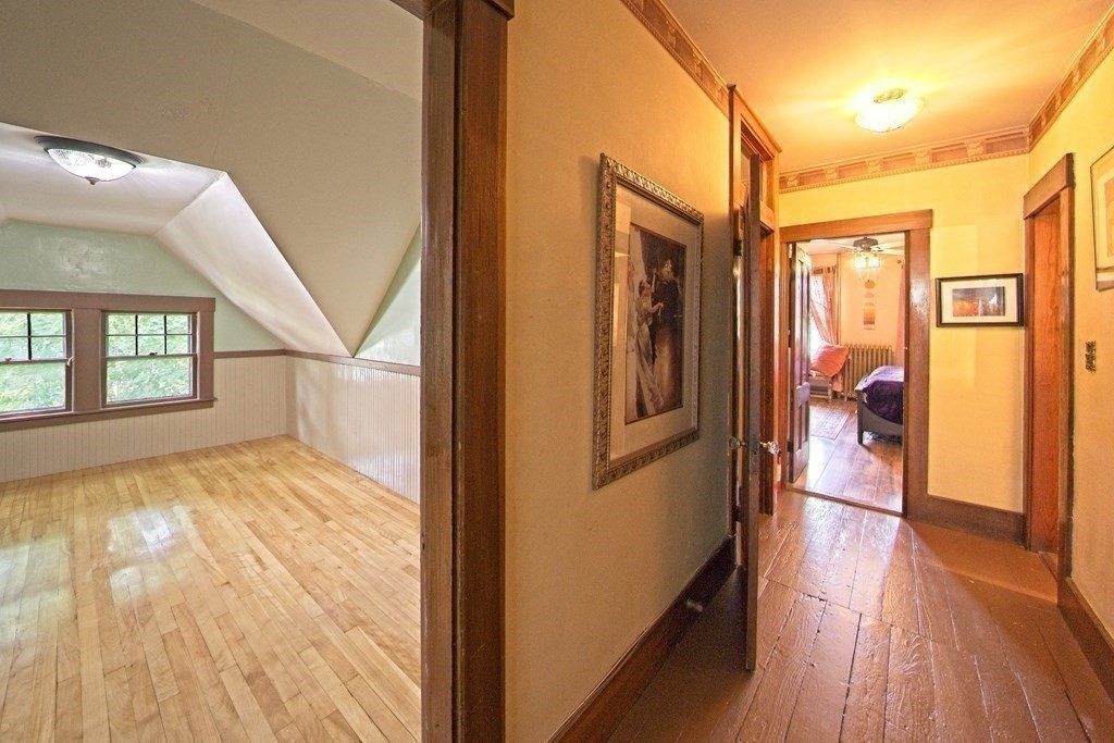 138 Walnut Street Clinton, MA 01510 - Photo 27 of 42 a view of hallway with livingroom and wooden floor