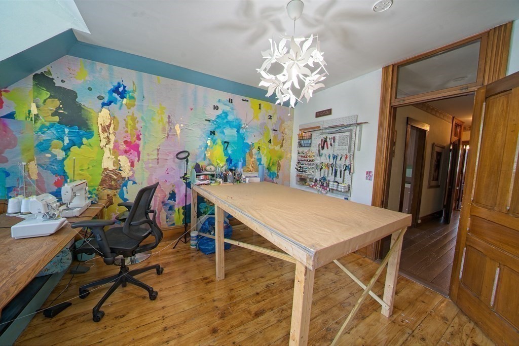 138 Walnut Street Clinton, MA 01510 - Photo 29 of 42 a view of a dining room with furniture and chandelier