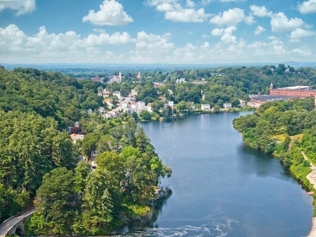 138 Walnut Street Clinton, MA 01510 - Photo 37 of 42 a view of a lake with houses in back