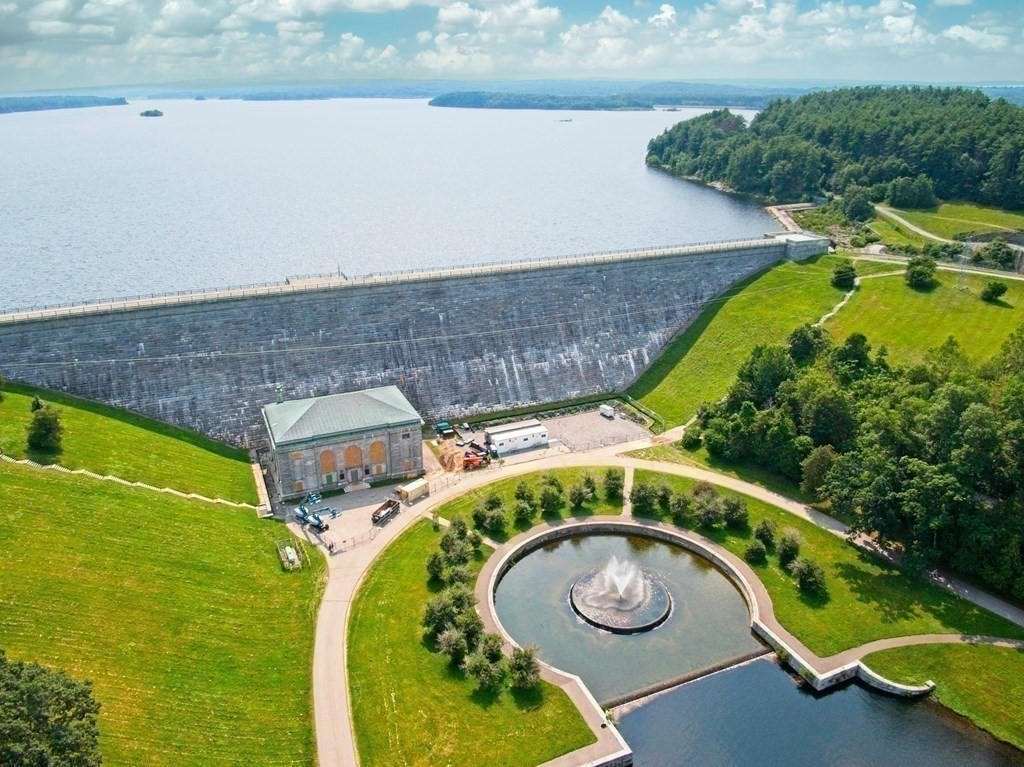 138 Walnut Street Clinton, MA 01510 - Photo 38 of 42 an aerial view of a swimming pool with outdoor seating and yard