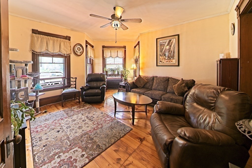 138 Walnut Street Clinton, MA 01510 - Photo 7 of 42 a living room with furniture or couch and a window