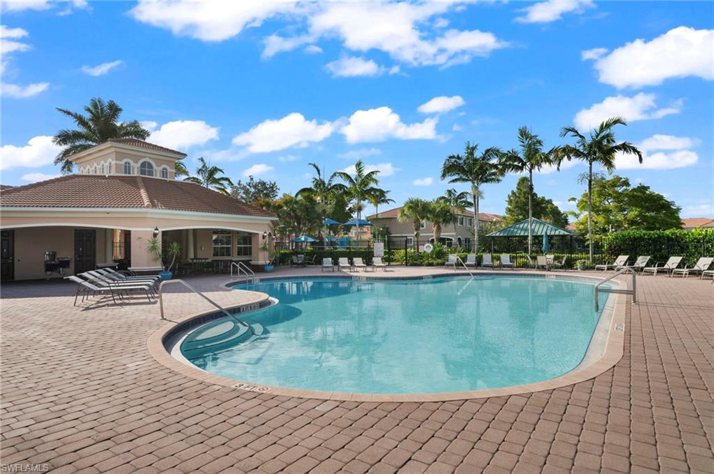 17567 Brickstone Loop Fort Myers, FL 33967 - Photo 26 of 27 a view of a swimming pool with a sitting space