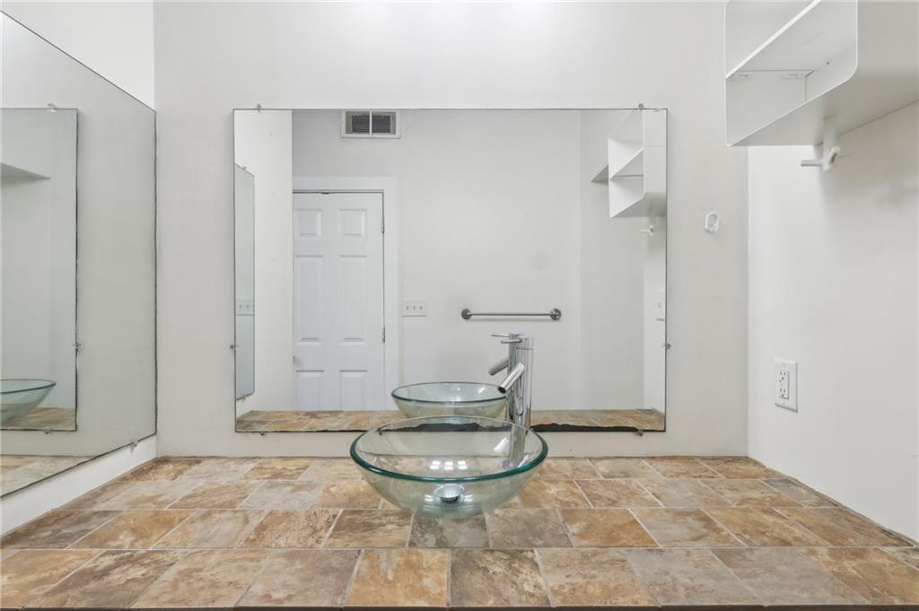 176 Lodi Way Pittsburgh, PA 15201 - Photo 14 of 28 a view of a bathroom with a sink and toilet