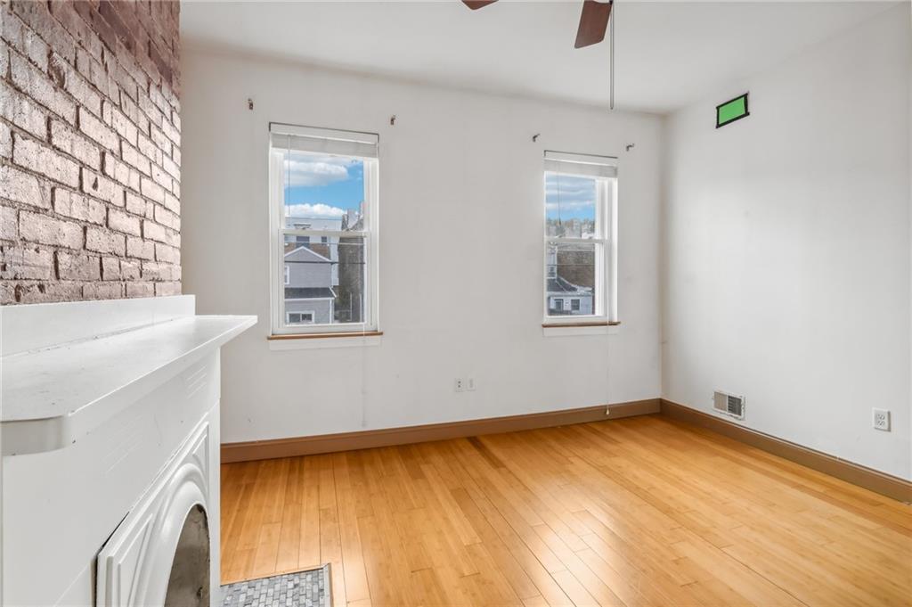176 Lodi Way Pittsburgh, PA 15201 - Photo 16 of 28 a bathroom with a sink and a window