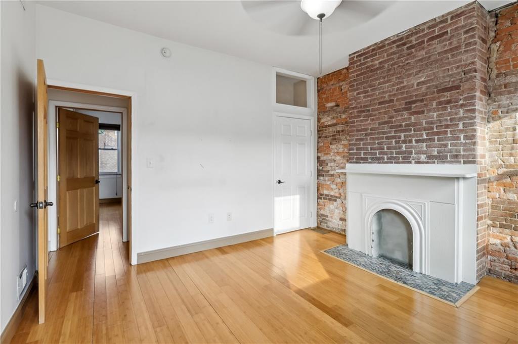 176 Lodi Way Pittsburgh, PA 15201 - Photo 18 of 28 a view of a livingroom with wooden floor