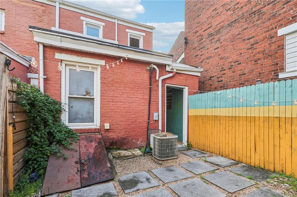 176 Lodi Way Pittsburgh, PA 15201 - Photo 23 of 28 a front view of a house with a garden