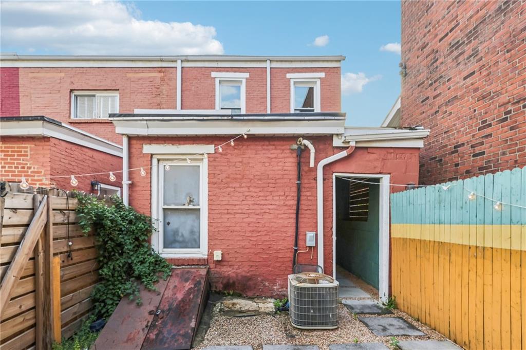 176 Lodi Way Pittsburgh, PA 15201 - Photo 24 of 28 a front view of a house with a yard