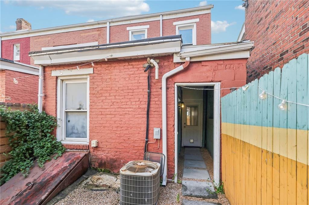 176 Lodi Way Pittsburgh, PA 15201 - Photo 25 of 28 a front view of a house with outdoor seating and plants