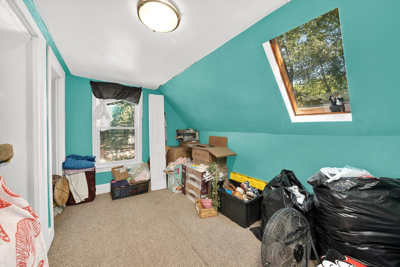 331 West 107th Street Chicago, IL 60628 - Photo 13 of 28 a living room with furniture and a large window