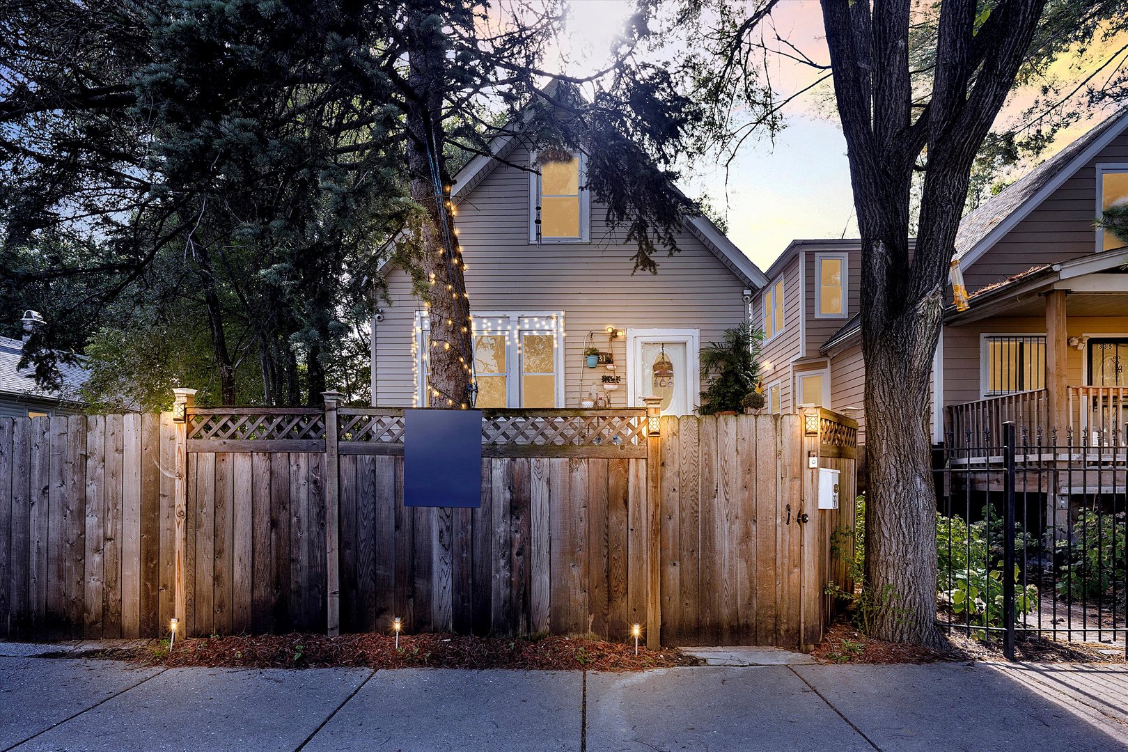 331 West 107th Street Chicago, IL 60628 - Photo 2 of 28 a front view of a house with a tree