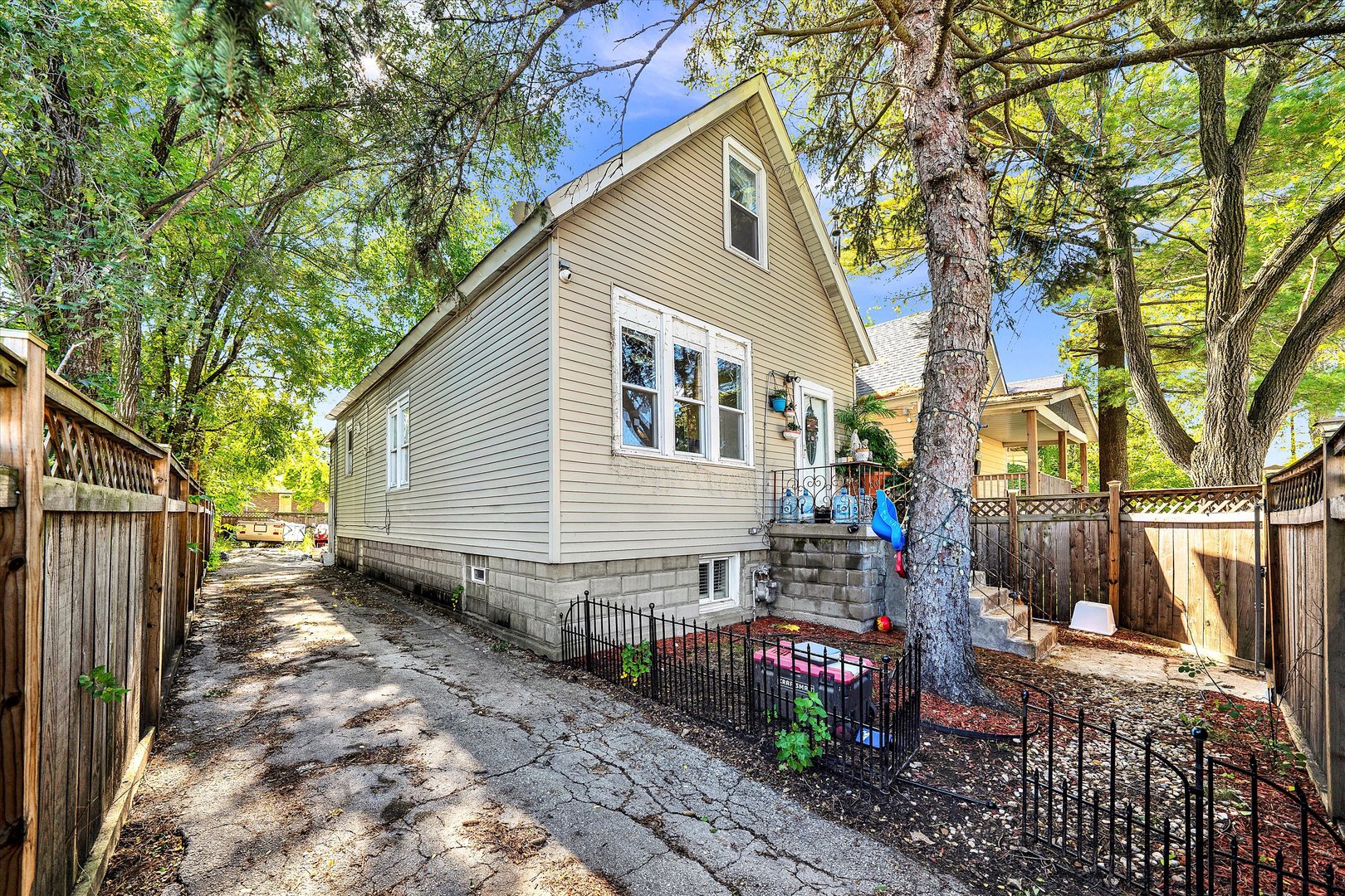 331 West 107th Street Chicago, IL 60628 - Photo 21 of 28 a view of a house with a yard