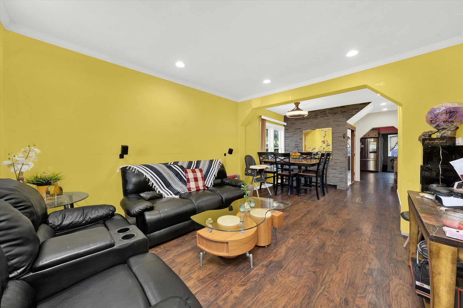331 West 107th Street Chicago, IL 60628 - Photo 3 of 28 a living room with furniture and a wooden floor
