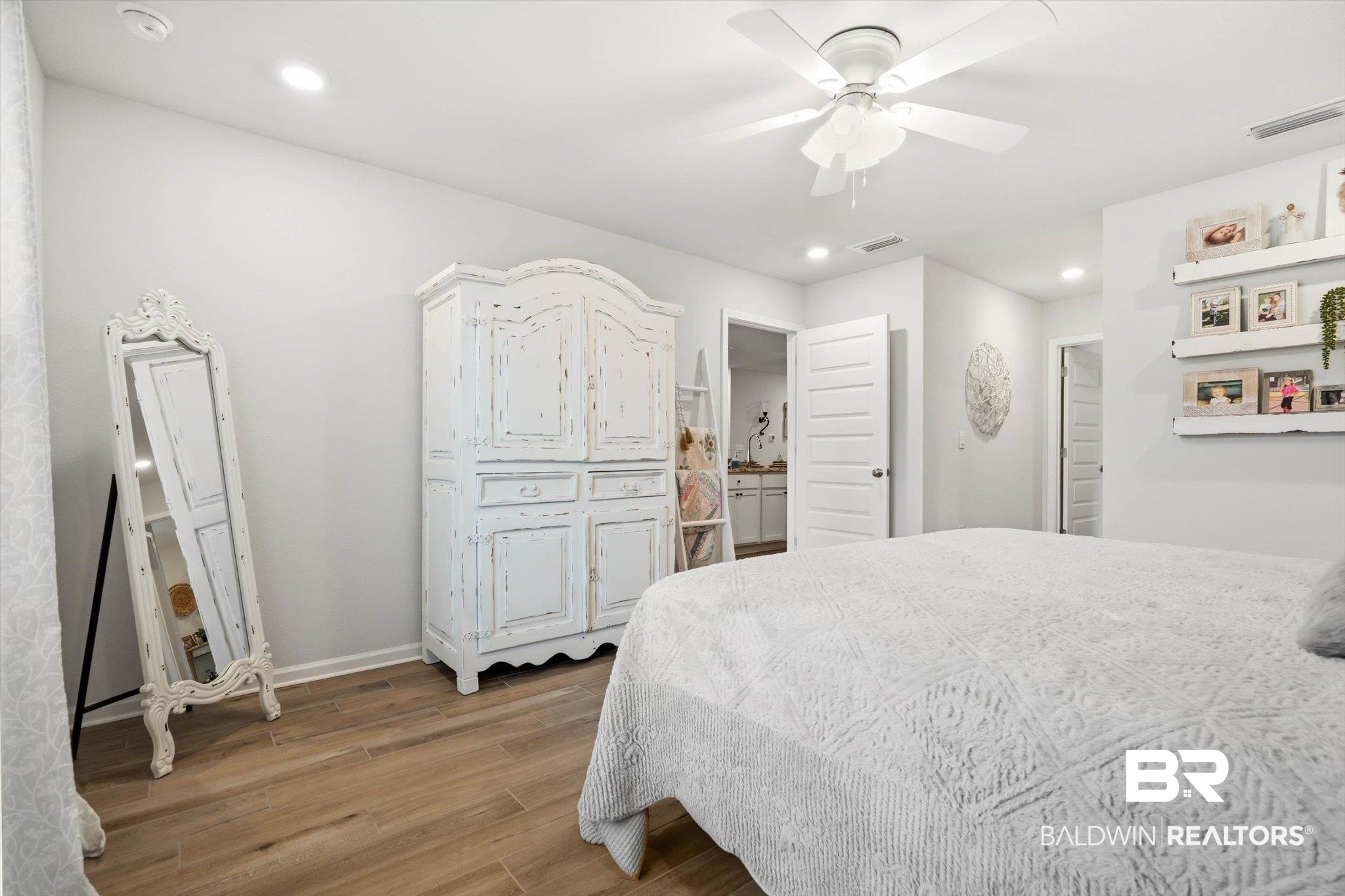 17041 Muse Street Loxley, AL 36551 - Photo 12 of 44 Bedroom featuring light wood-style flooring, ceiling fan, and recessed lighting