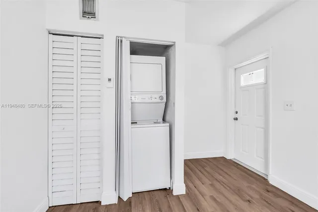 a view of storage and utility room in wooden floor