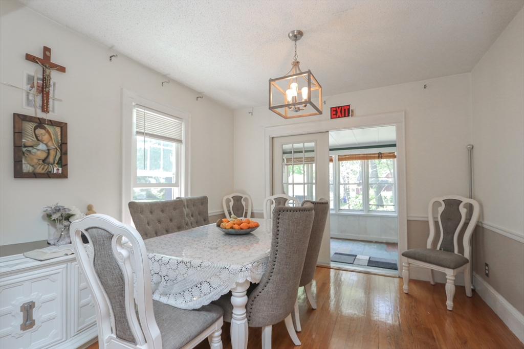 34 Preston Street Springfield, MA 01109 - Photo 9 of 34 a view of a dining room with furniture window and wooden floor