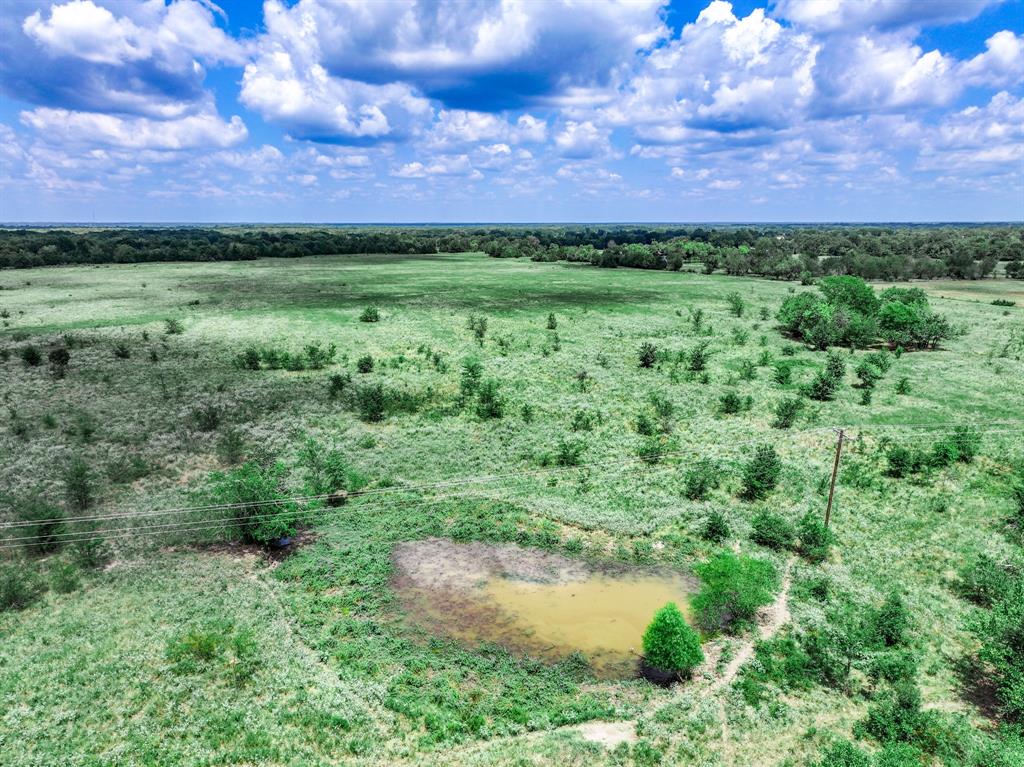 0 Fm 71 Highway Talco, TX 75487 - Photo 26 of 29 a view of a lake with a house in the background