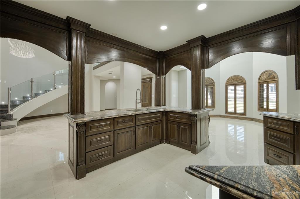 2916 Fletcher Street Weslaco, TX 78599 - Photo 12 of 45 a large bathroom with double vanity and a large mirror