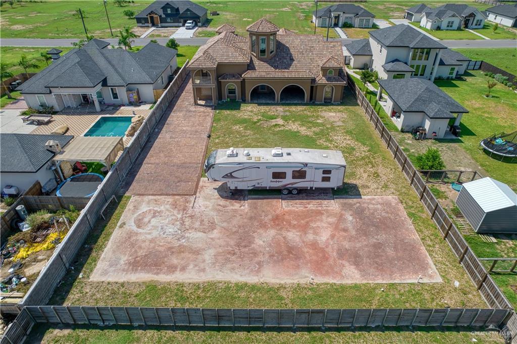 2916 Fletcher Street Weslaco, TX 78599 - Photo 2 of 45 an aerial view of a house with a yard