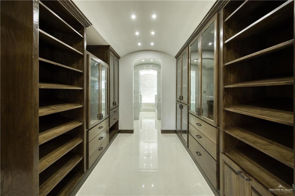 2916 Fletcher Street Weslaco, TX 78599 - Photo 21 of 45 a view of walk in closet with empty racks