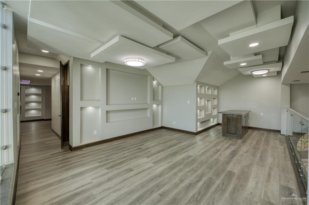 2916 Fletcher Street Weslaco, TX 78599 - Photo 30 of 45 a view of a hallway with wooden floor