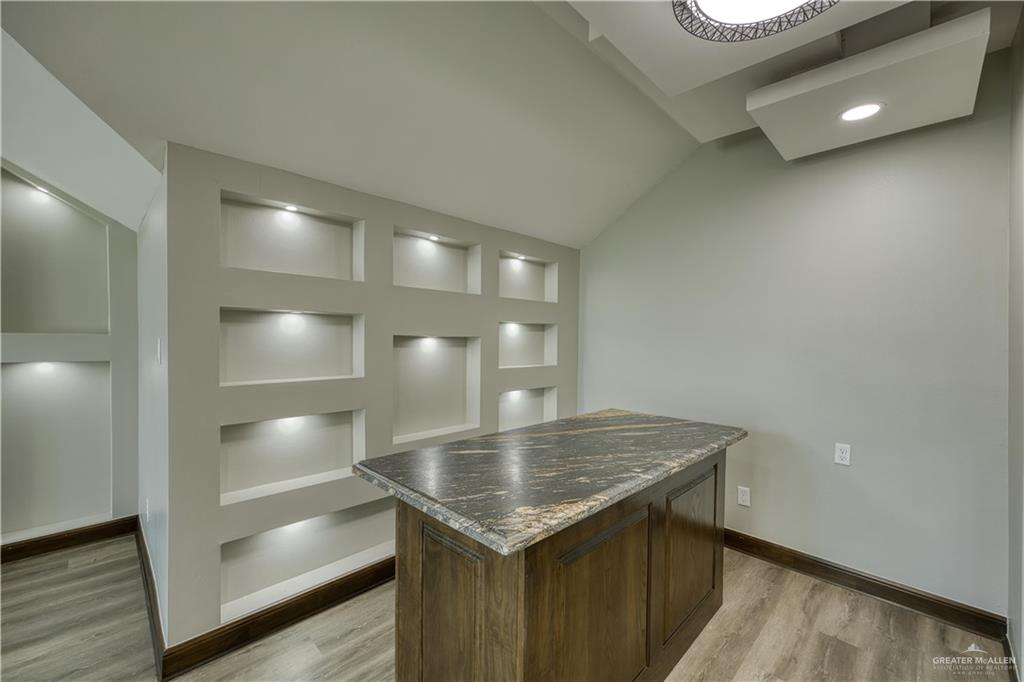 2916 Fletcher Street Weslaco, TX 78599 - Photo 32 of 45 a kitchen with a table and chairs