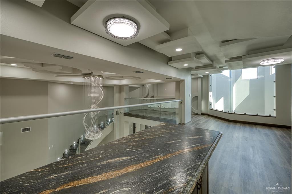 2916 Fletcher Street Weslaco, TX 78599 - Photo 33 of 45 a view of a room with gym equipment