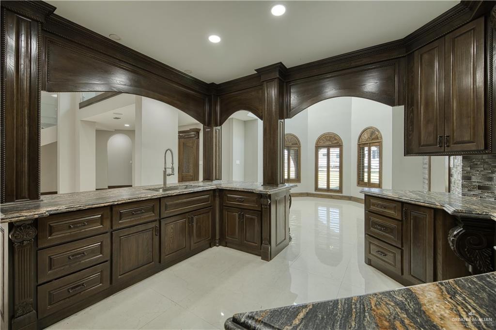 2916 Fletcher Street Weslaco, TX 78599 - Photo 10 of 45 a large bathroom with double vanity and a mirror