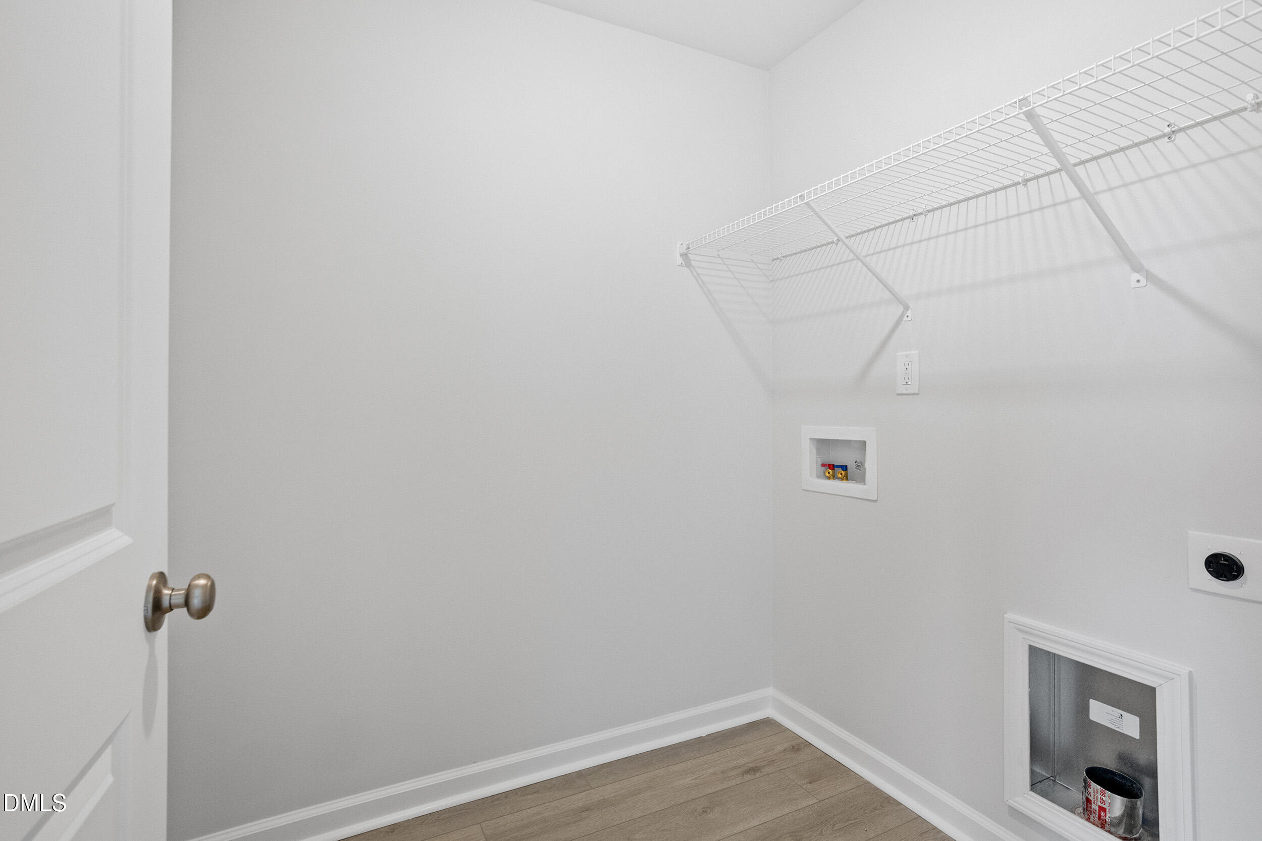 79 Osgood Street Angier, NC 27501 - Photo 24 of 31 a view of a room with racks on the wall