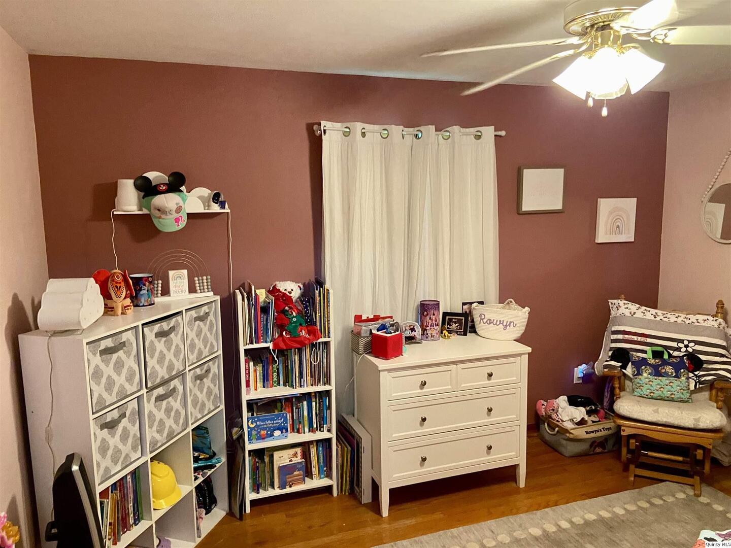 1632 North 24th Street Quincy, IL 62301 - Photo 19 of 36 a bedroom with a bed and wooden floor